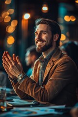 Obraz premium Celebration event with a happy man clapping cozy restaurant portrait photography warm lighting joyful atmosphere human connection