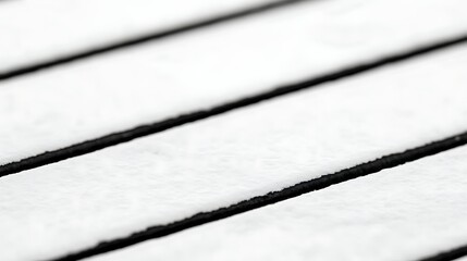 Abstract design with black straight lines on a white background, minimalistic and modern, suitable for creative and artistic projects.