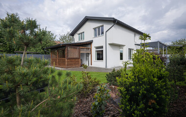 Modern private house at daytime in spring