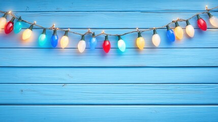Obraz premium Multicolored string lights hung on a textured blue wooden wall, creating a vibrant decorative display.