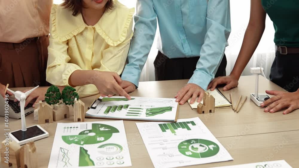 Poster business team consulting and analyzing green power graph usage for future esg of company. windmill m