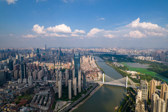 Aerial view of Wuhan skyline and Yangtze river with supertall skyscraper under construction in Wuhan Hubei China. - Powered by Adobe