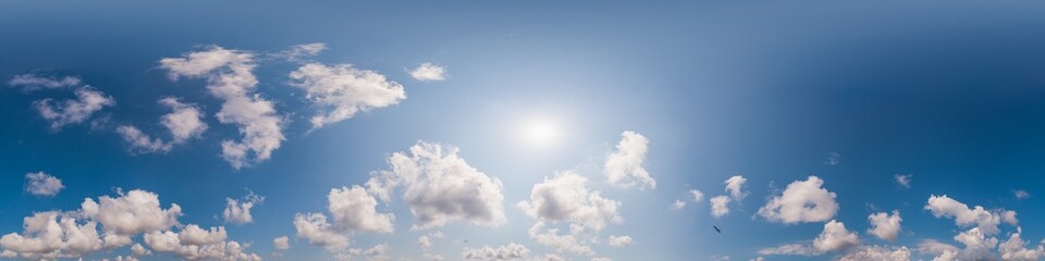 Sky 360 panorama - Bright blue sky filled with fluffy white Cumulus clouds. Seamless hdr spherical 360 panorama. Sky dome, sky replacement for aerial drone 360 panoramas. Weather and climate change