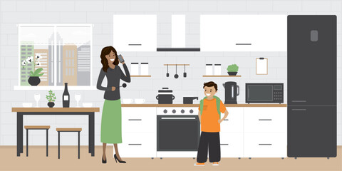 Hispanic mother and schoolboy in kitchen interior with various furniture and electronic gadgets. Brick wall on background. People talking on kitchen room, part of home