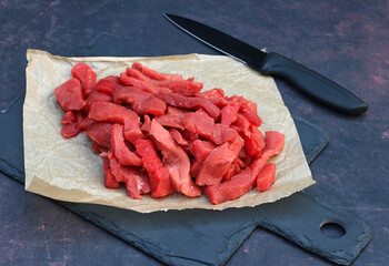 Beef strips: Raw beef cut into strips.
