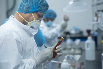 Doctor in Lab making medicine 