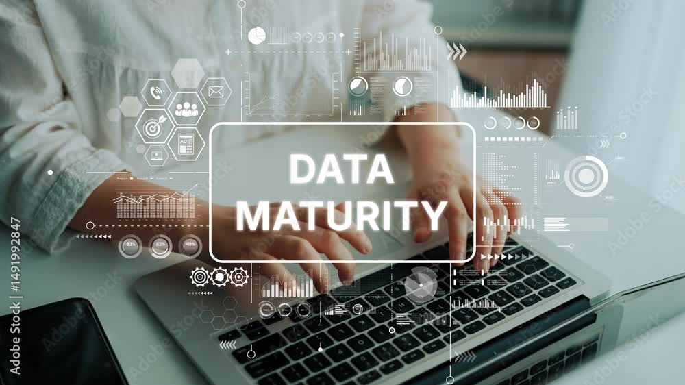 Poster hands typing on laptop with digital data maturity concept and analytics graphics overlay in modern w