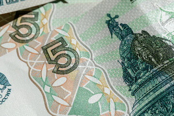 Close-up of Russian banknotes. Denomination of five rubles.