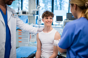 Vaccination of teenage boy during routine health checkup at hospital