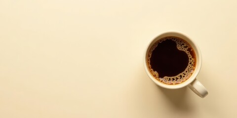 Aromatic Dark Roast Coffee in a Simple Mug on a Pale Background