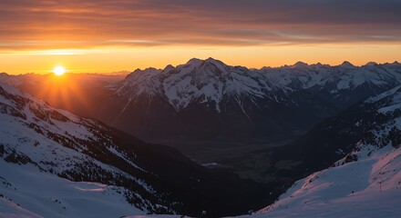 Snowy Mountains at Sunrise with Golden Light and Orange Sky