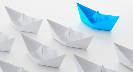 A blue paper boat leading a fleet of white paper boats on a white surface with soft shadows visible