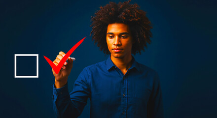 A man with afro hair marking a check box with a red check mark on a dark blue background screen