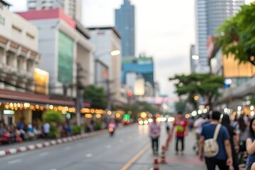 Fototapeta premium Bustling city street with blurred evening lights
