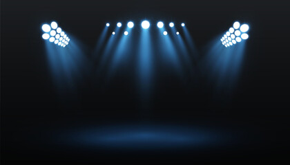 Realistic stage lighting with bright blue spotlights beaming into darkness. Glowing rays create a dramatic concert or theater scene for backgrounds, banners, posters, and performances.

