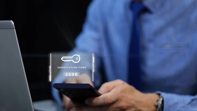 Businessman Using Smartphone With Holographic Verification Code Popping Out. Two-Factor Authentication (2FA) Concept. closeup shot, digital graphics