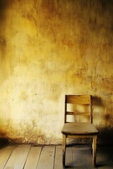 Empty chair against a textured wall