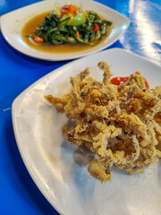 Fried squid with rica rica flour 