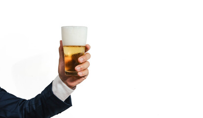 Two glasses of cold, golden beer with foam are clinked together in a joyful toast, celebrating...
