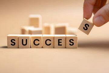 Building block concept illustrates the creation of success with intention and focus