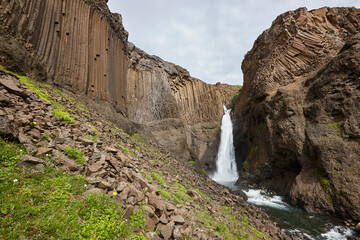 Litlanesfoss waterfall and basaltic rocks. Lagarfljot area. East jfords. Iceland
