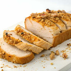 A piece of chicken bread on a white background, showcasing its golden-brown crust and tender filling. 