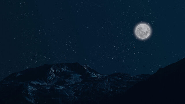 Fototapeta a a movement of stars in the night sky with the view of mountains.