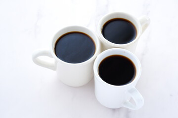 Three cups of Coffee image
