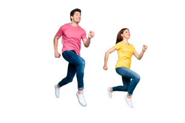 Full length body size profile side view of nice attractive sportive cheerful cheery active couple running in air having fun isolated over bright vivid shine vibrant green turquoise background