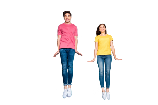 Full length body size view of nice attractive lovely cute funky cheerful cheery modest couple jumping in air having fun time isolated on bright vivid shine vibrant green turquoise background