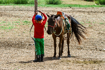 Horseback riding in the grassland of mongolia