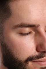 Handsome man before eyebrows correction, closeup view