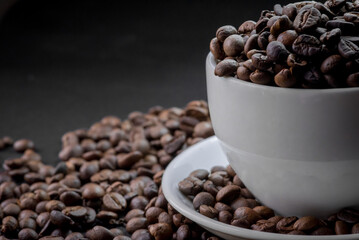 Close up of coffee beans are the background.