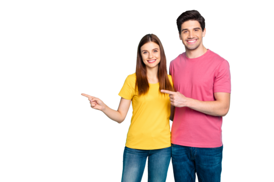 Portrait of his he her she nice attractive lovely cheerful cheery content couple hugging pointing aside ad advert solution isolated over bright vivid shine vibrant green turquoise background