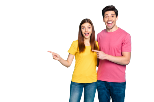 Portrait of his he her she nice attractive lovely cheerful cheery ecstatic glad couple hugging pointing aside ad advert good news isolated over bright vivid shine vibrant green turquoise background