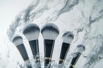 Makeup brushes with water splash effect for beauty and cosmetic product promotion, advertising, and visual content creation.