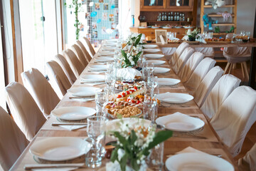 Beautiful Table Set for Dinner with Flowers