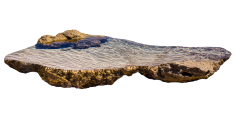Elevated rock formation with water surface reflections, cut out transparent
