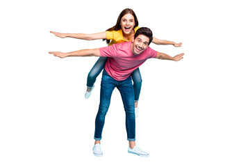 Full length body size view of nice attractive playful funny cheerful cheery couple guy carrying...