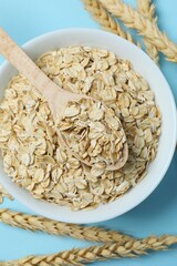 Composition with oatmeal flakes. Cooking breakfast, space for text