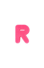 Colored clay shaped like the English letter R. Pink color