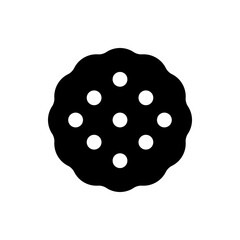 A simple black cookie with wavy edges and seven white dots arranged in a central pattern design element