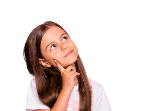 Closeup photo of small lady brown hair minded deep thinking curious interested wear overall t-shirt isolated pink background