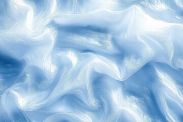 Obraz premium Close-up of flowing, smooth light blue and white fabric with gentle folds and soft texture conveying calmness and fluidity