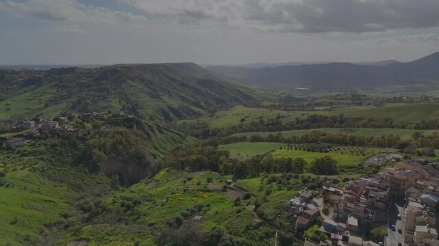 Flight over Sicily hills near Caltagirone countryside during spring day