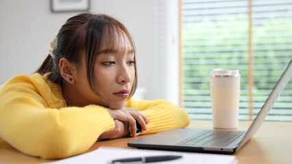 Asia people young woman study hard brownout bored remote work coding online read data tired sitting lying down at home desk think worry in career job tough stress workforce mental health issue illness