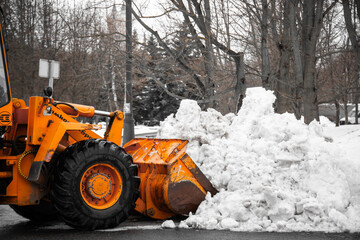 An excavator is clearing snow. © Святослав Афонин