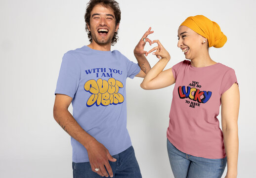 Interracial couple expresses happiness while wearing T-shirts. PSD template mockup