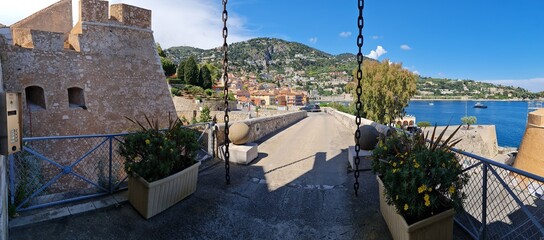Views from the historic Citadelle Saint-Elme in Villefranche-sur-Mer reveal a blend of centuries-old stone walls, vibrant gardens, and panoramic vistas over the Mediterranean Sea and the colorful roof