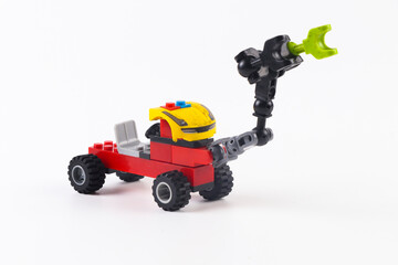 Fototapeta premium Colorful bricks construction vehicle toy that developes creativity and imagination.